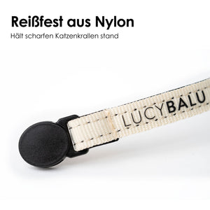 Primo piano della fascia in nylon DORI resistente allo strappo con scritta LucyBalu e clip