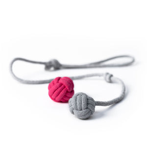 Set di palline KNOT BALLS in rosa e grigio con corda da lancio