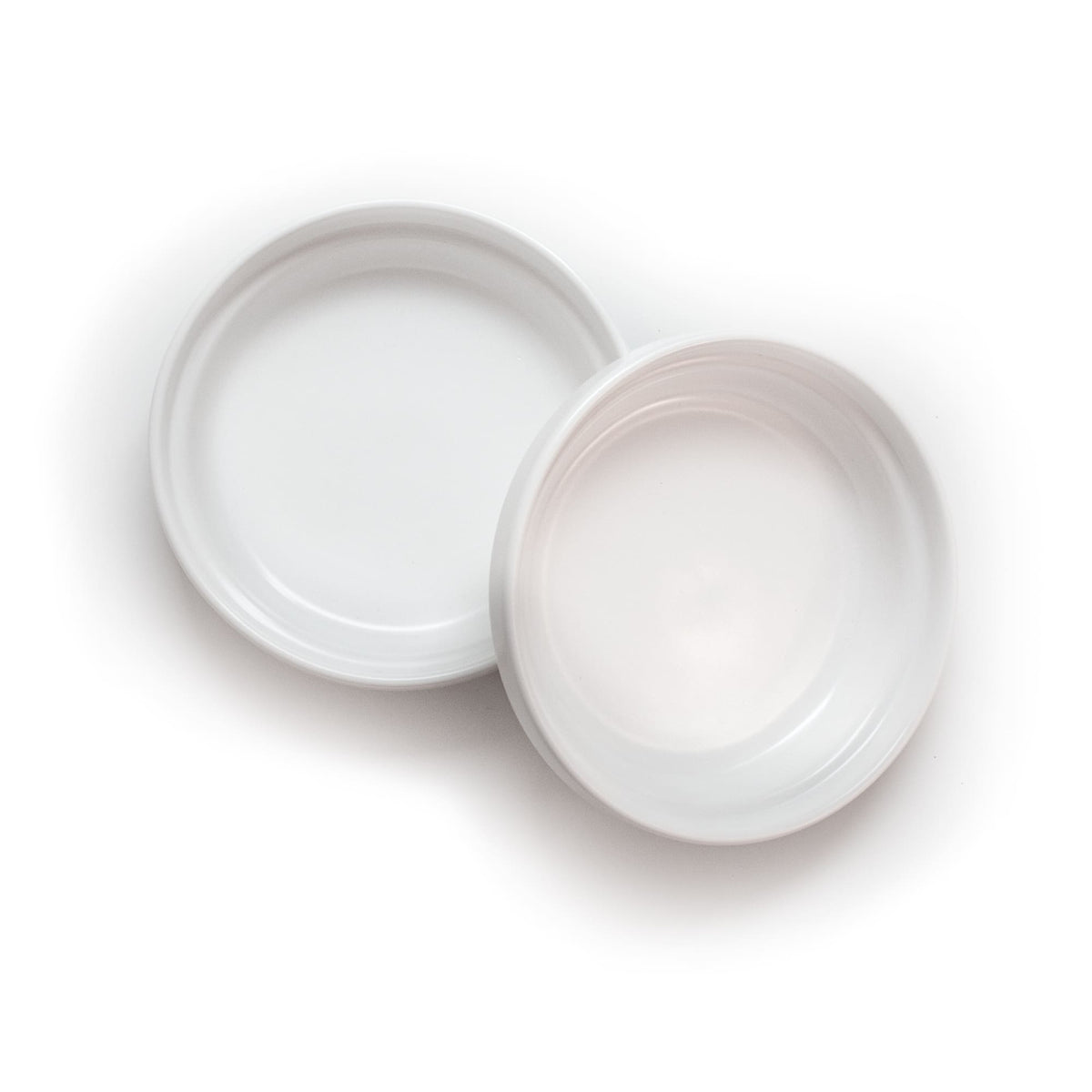 Bol en porcelaine BOWL en blanc – deux bols sur photo produit détourée.