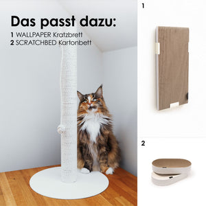 Colonna tiragraffi PAPERPOLE in bianco nell'angolo della stanza con gatto – abbinati: tavola da grattare WALLPAPER e cuccia in cartone SCRATCHBED.