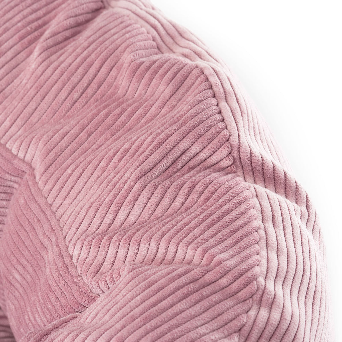 Nahaufnahme der samtig weichen Cord-Textur des rosa DINGHY Katzenbetts Hello Kitty Edition